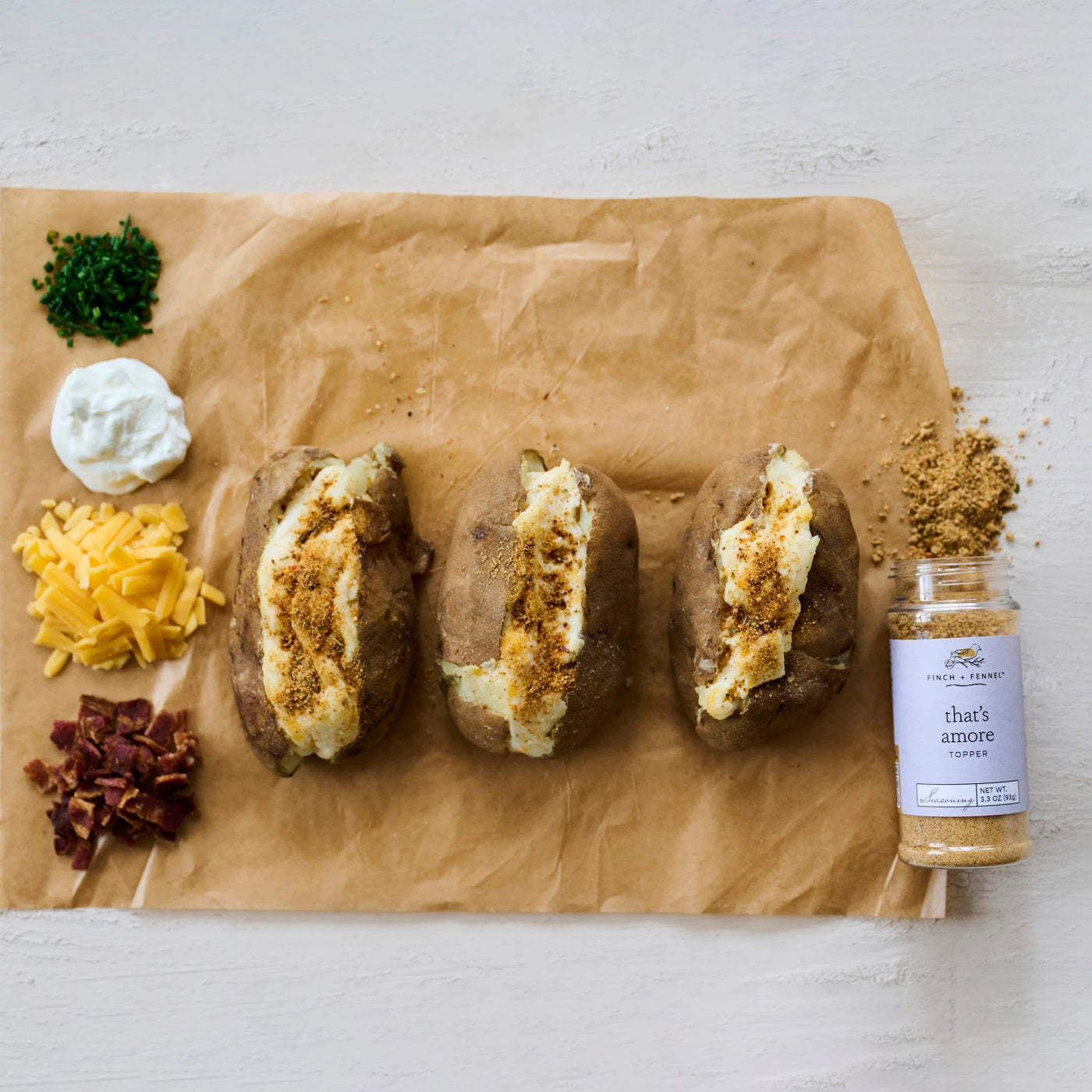 3.3 oz. That's Amore Topper Seasoning