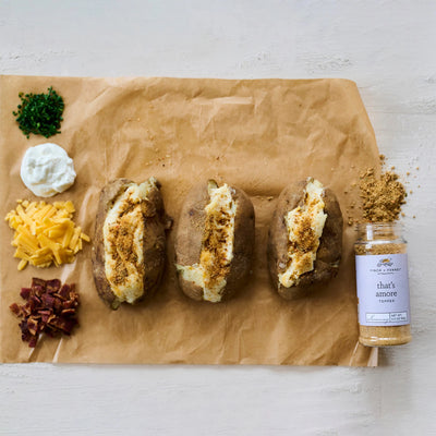 3.3 oz. That's Amore Topper Seasoning